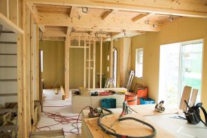 Construction site with exposed wooden framing